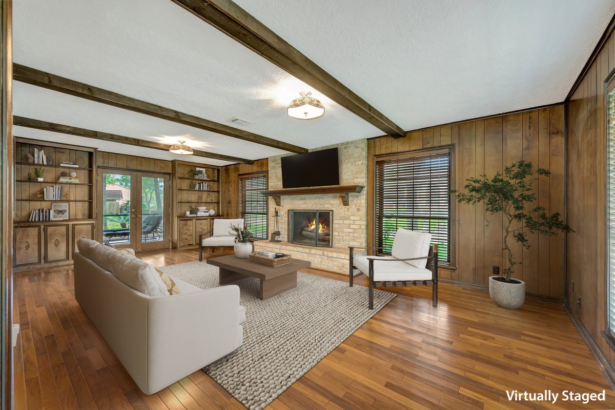 822 Devonport Lane Seabrook, TX 77586 - Photo 20 of 50 a living room with fireplace furniture and a large window