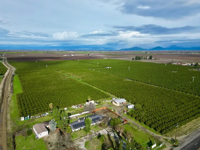 a view of a golf course with a lake
