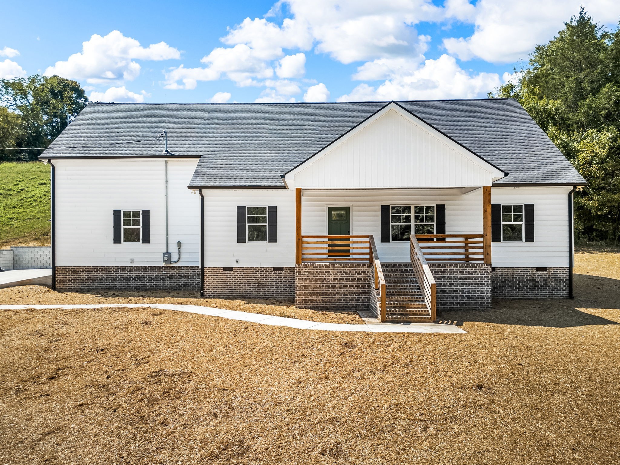 2305 Hurricane Creek Road Lynchburg, TN 37352 - Photo 1 of 54 a front view of a house with a yard