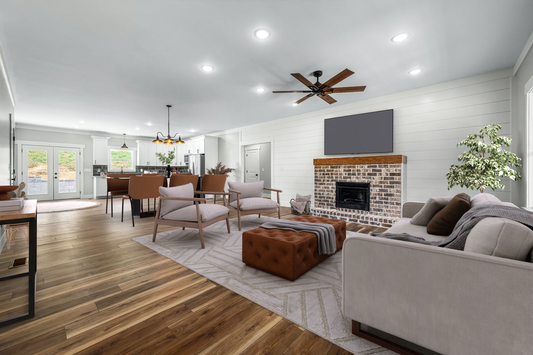 2305 Hurricane Creek Road Lynchburg, TN 37352 - Photo 22 of 54 a living room with furniture a fireplace and a chandelier