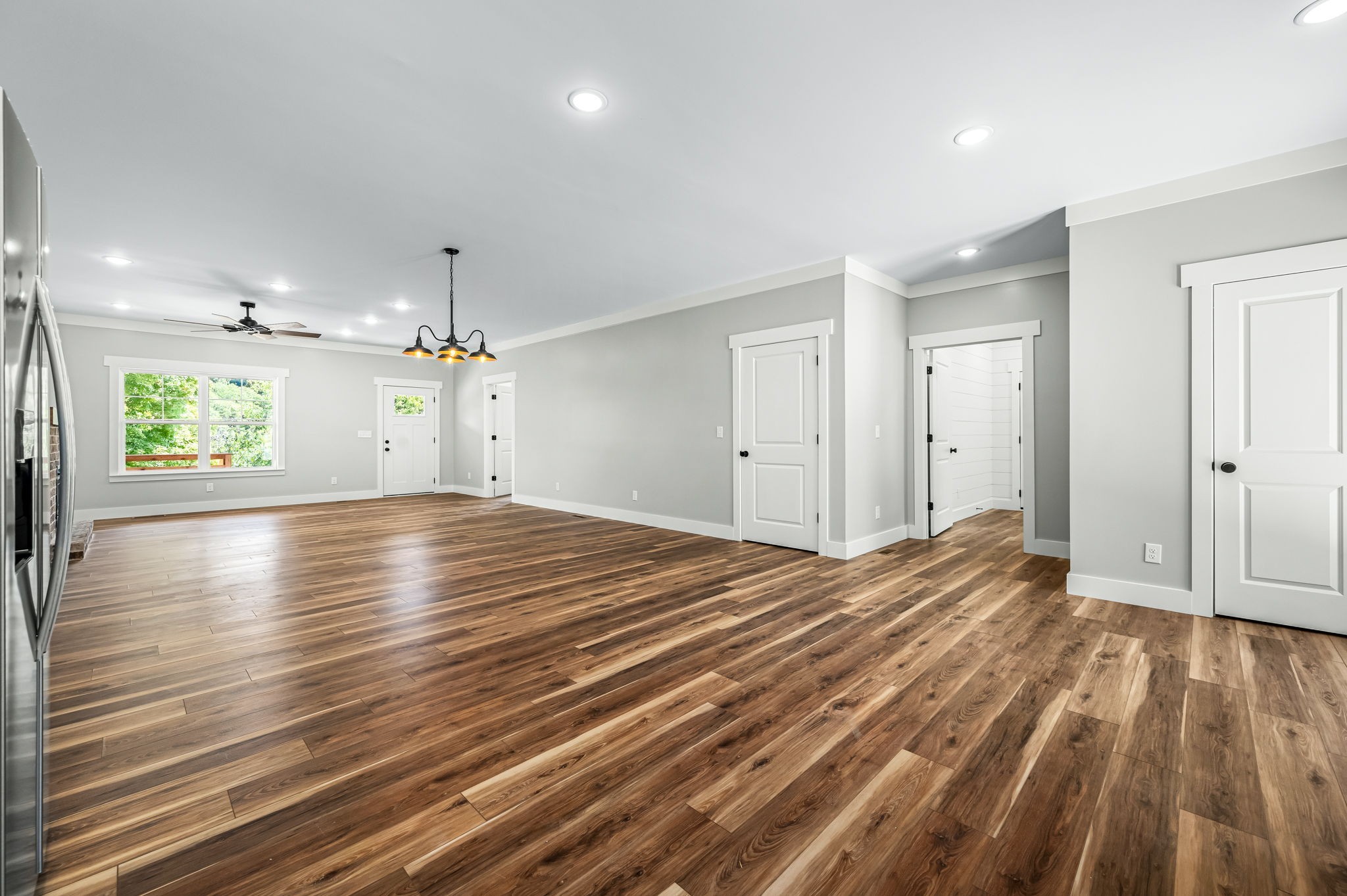 2305 Hurricane Creek Road Lynchburg, TN 37352 - Photo 24 of 54 wooden floor in an empty room with a window