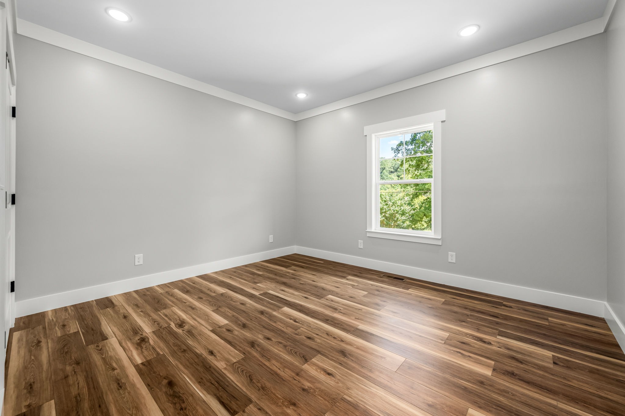 2305 Hurricane Creek Road Lynchburg, TN 37352 - Photo 30 of 54 wooden floor in an empty room with a window