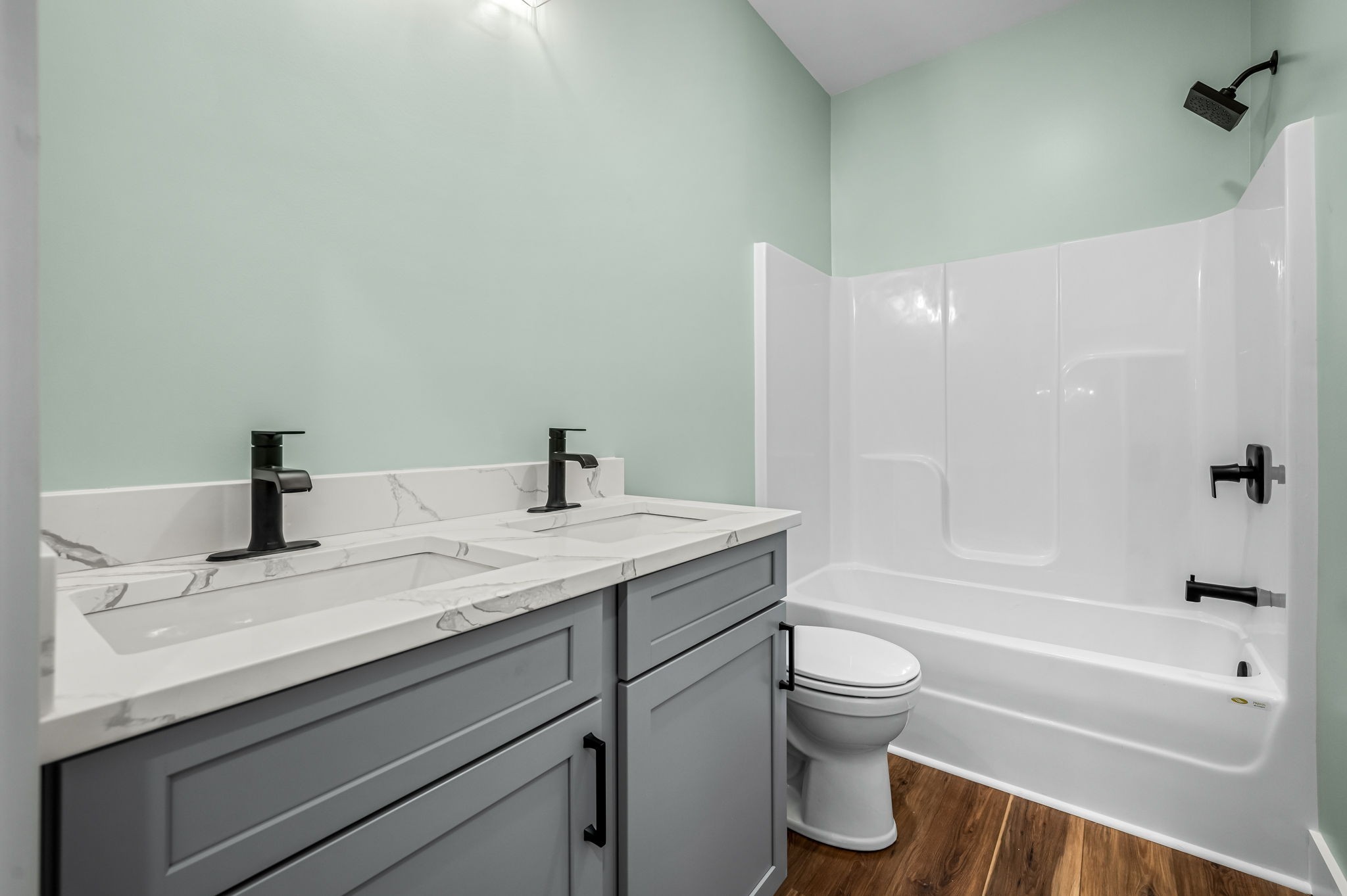 2305 Hurricane Creek Road Lynchburg, TN 37352 - Photo 36 of 54 a bathroom with a granite countertop sink toilet and bathtub