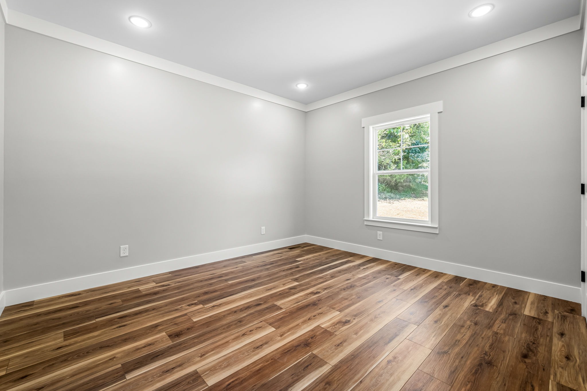 2305 Hurricane Creek Road Lynchburg, TN 37352 - Photo 37 of 54 wooden floor in an empty room with a window