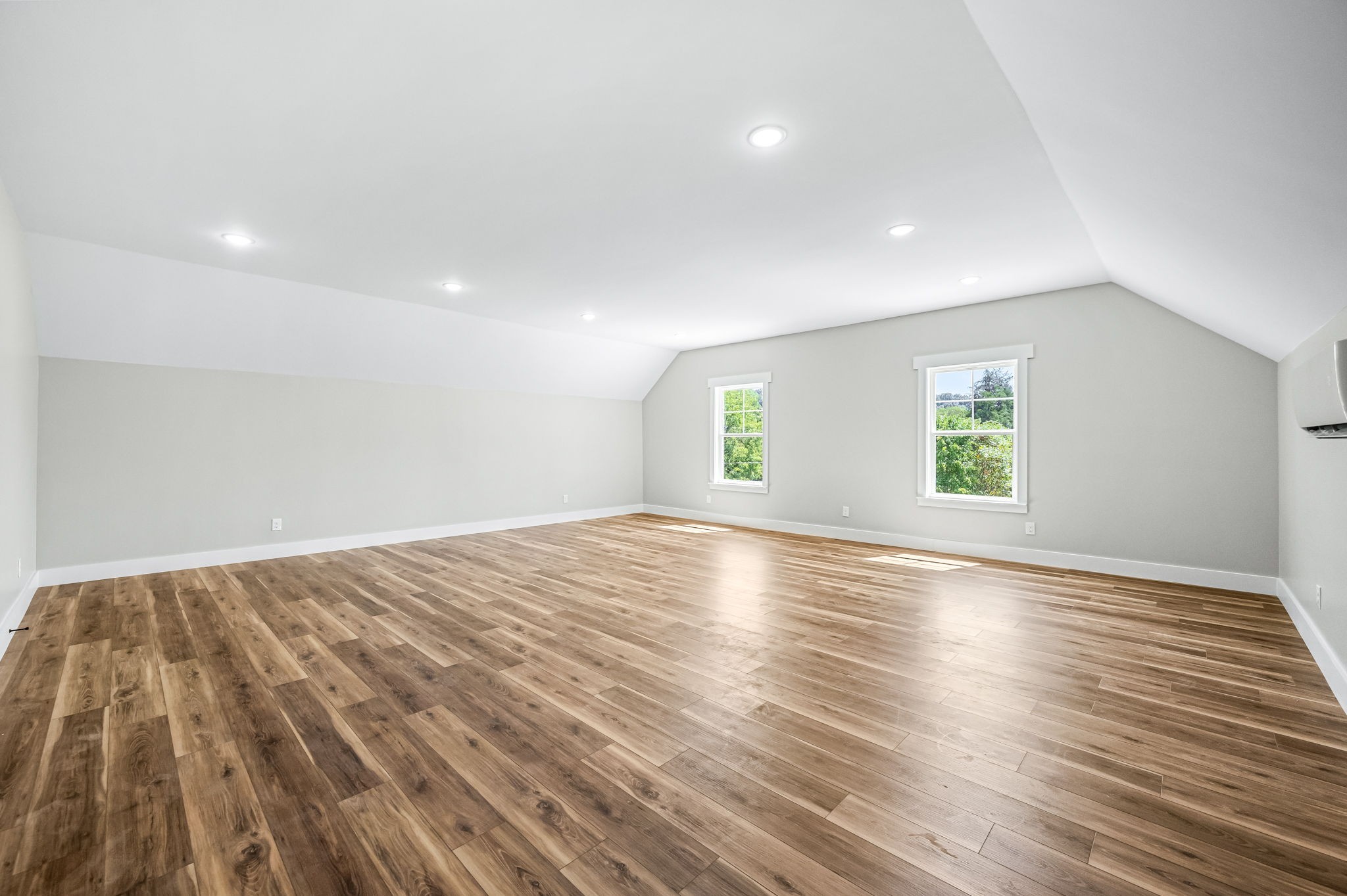 2305 Hurricane Creek Road Lynchburg, TN 37352 - Photo 40 of 54 an empty room with wooden floor and windows