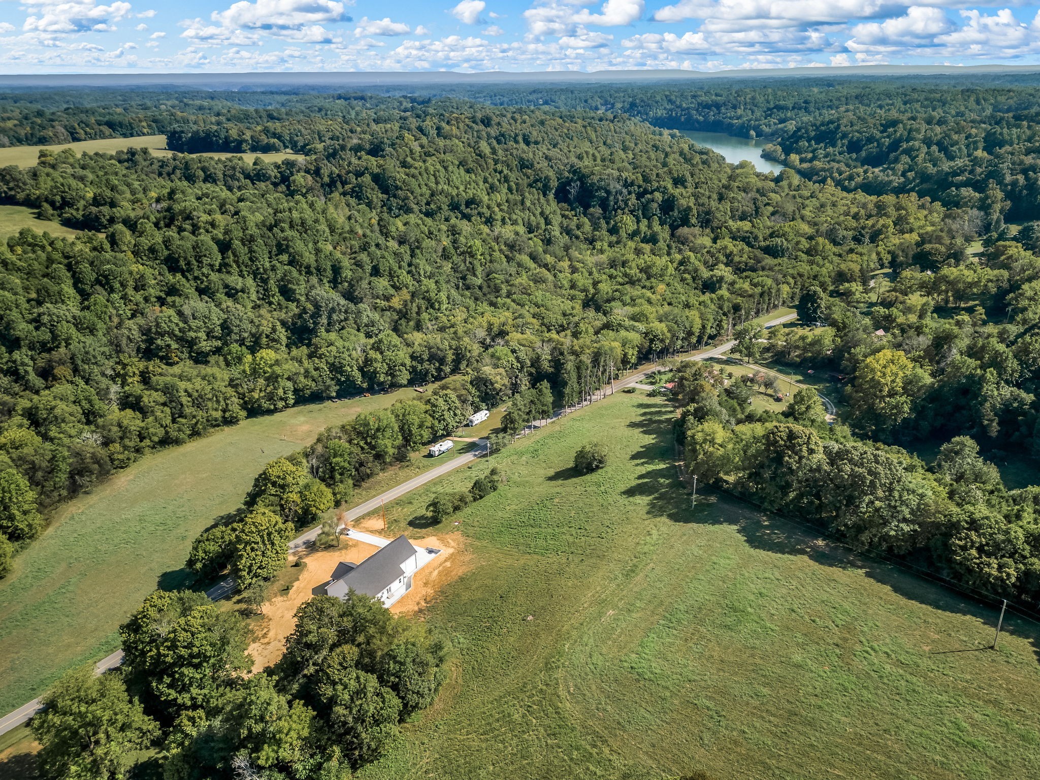 2305 Hurricane Creek Road Lynchburg, TN 37352 - Photo 53 of 54 a view of a lush green forest with lots of trees
