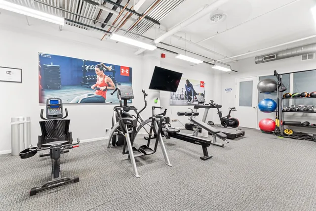 a view of a room with gym equipment