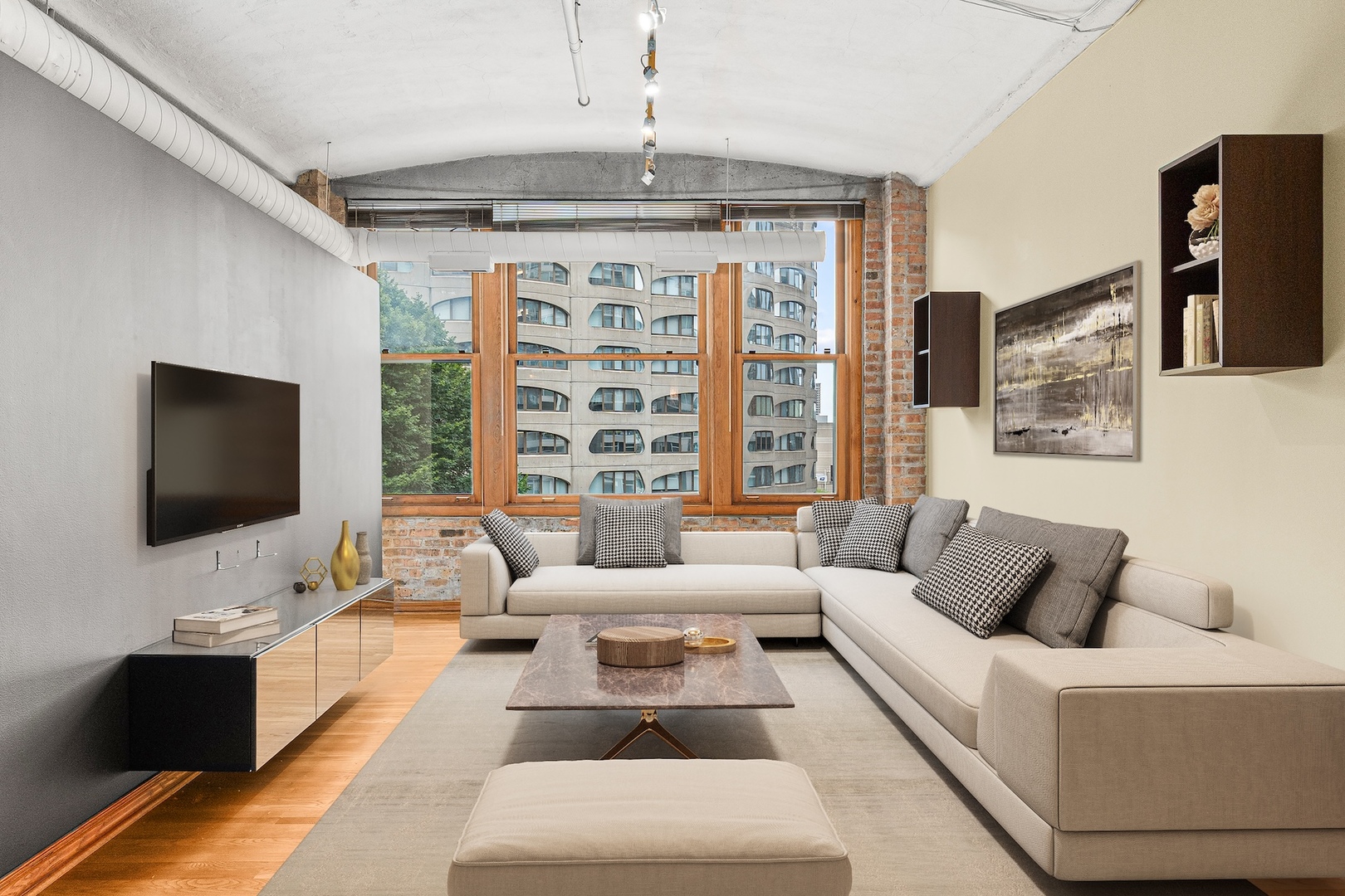 801 South Wells Street, Unit 503 Chicago, IL 60607 - Photo 4 of 21 a living room with furniture and a flat screen tv