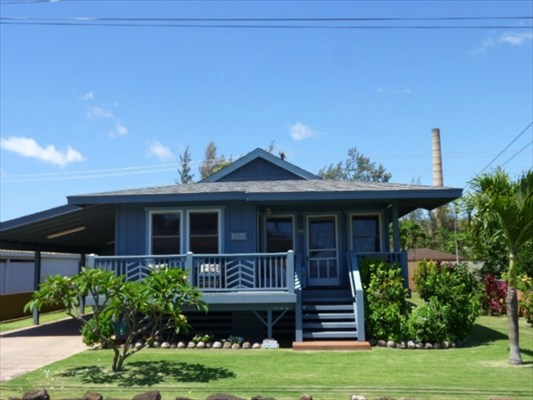 8325 Elepaio Road Kekaha, HI 96752 - Photo 1 of 10 a front view of a house with garden