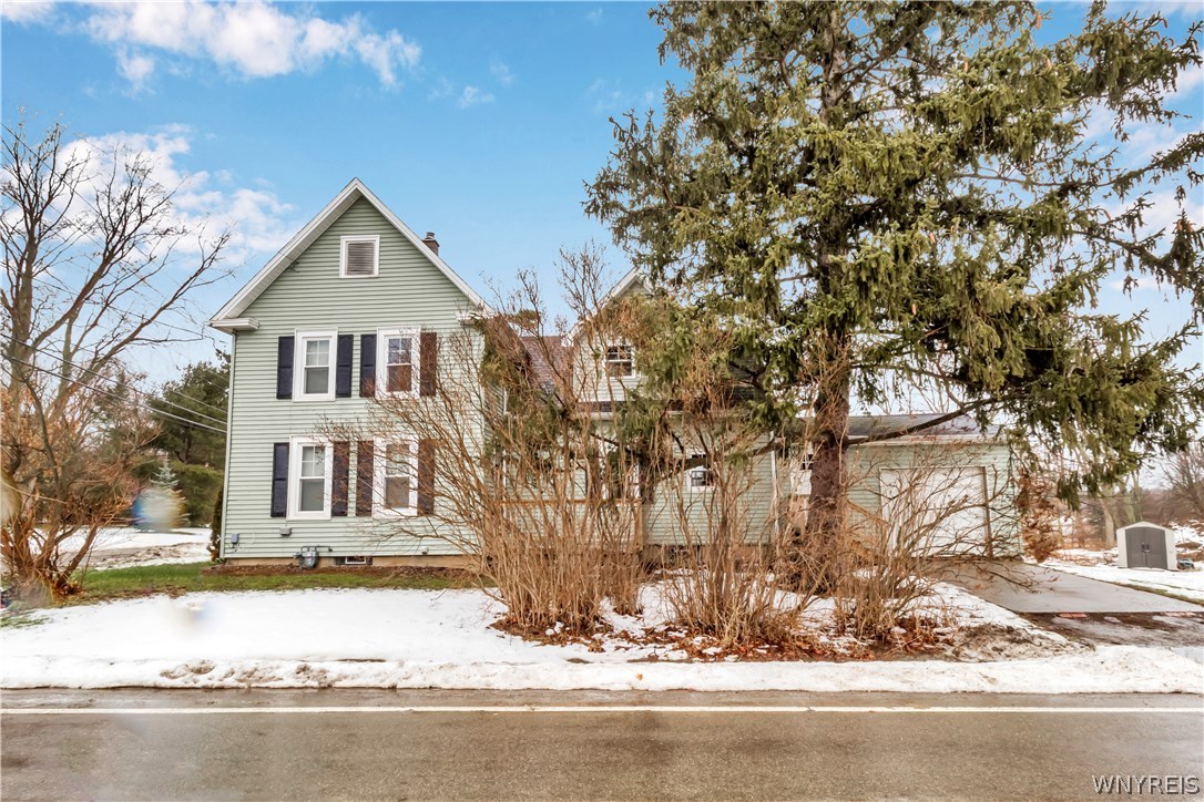 Welcome to 7097 Taylor Rd  Just under one acre, mi