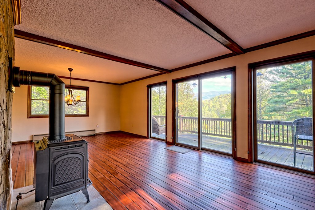 206 Peckerwood Road Hayesville, NC 28904 - Photo 14 of 73 a view of front door with wooden floor