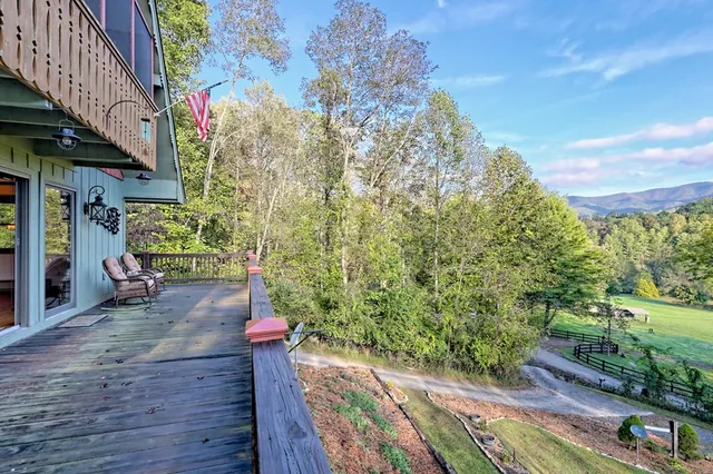a view of a swimming pool with sitting area