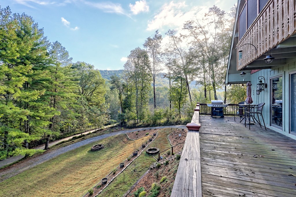 206 Peckerwood Road Hayesville, NC 28904 - Photo 18 of 73 a view of a swimming pool with sitting area