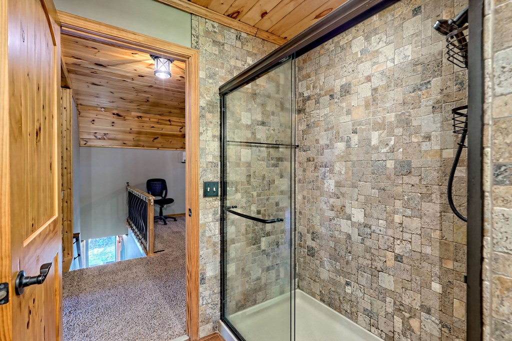 206 Peckerwood Road Hayesville, NC 28904 - Photo 37 of 73 a bathroom with a shower and a sink