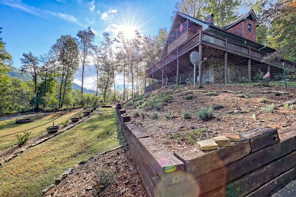 206 Peckerwood Road Hayesville, NC 28904 - Photo 55 of 73 a view of a house with a yard