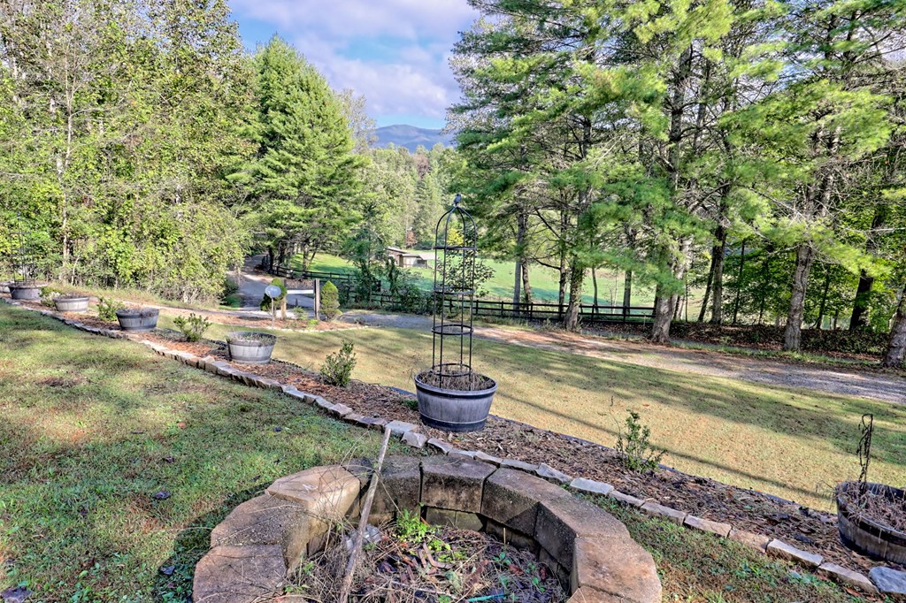 206 Peckerwood Road Hayesville, NC 28904 - Photo 69 of 73 a view of a backyard with swimming pool