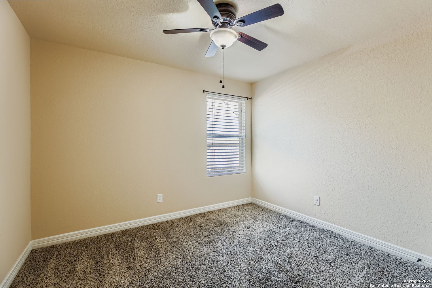 17820 Oxford Mount Helotes, TX 78023 - Photo 20 of 26 a view of an empty room with a window