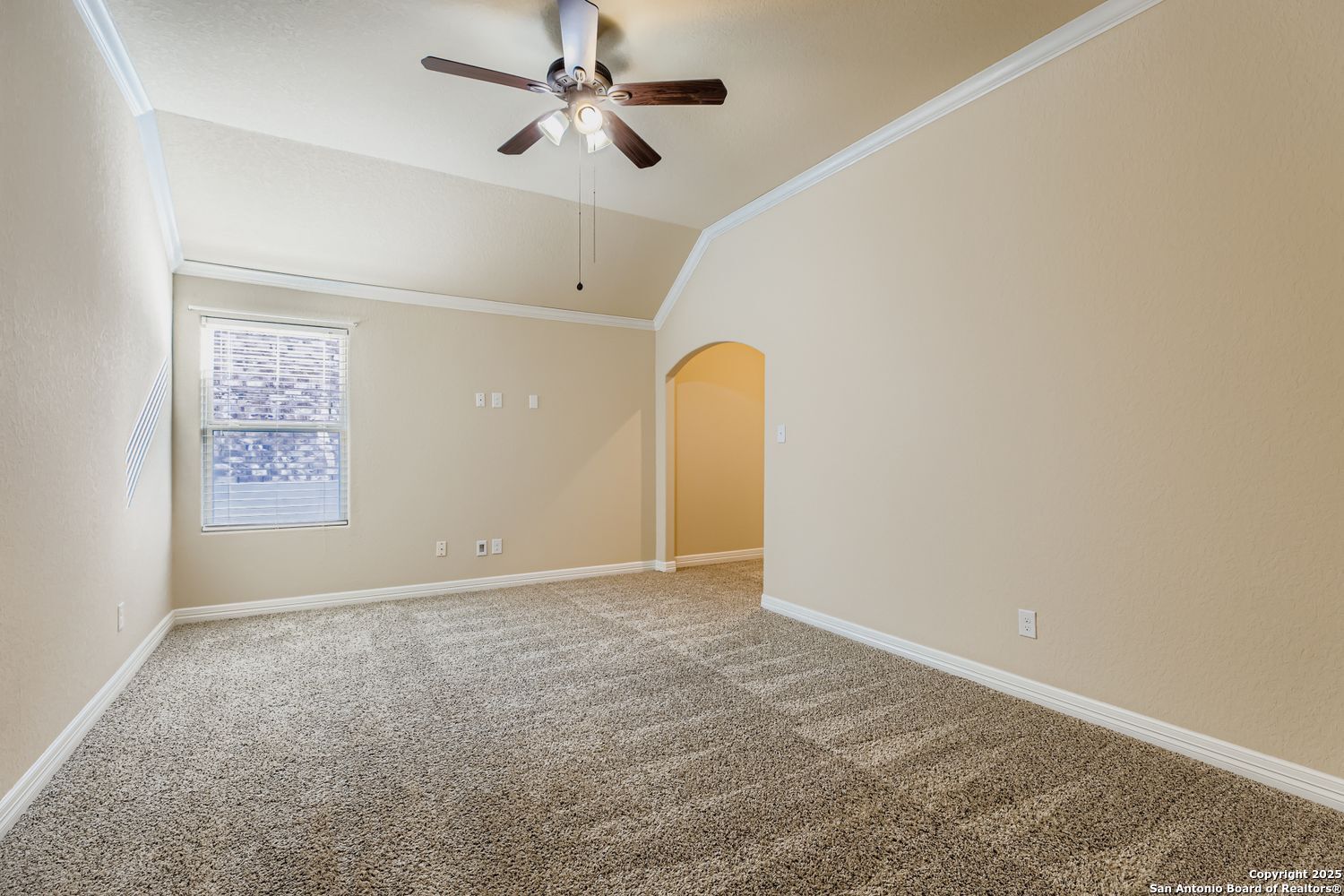 17820 Oxford Mount Helotes, TX 78023 - Photo 22 of 26 an empty room with windows and fan