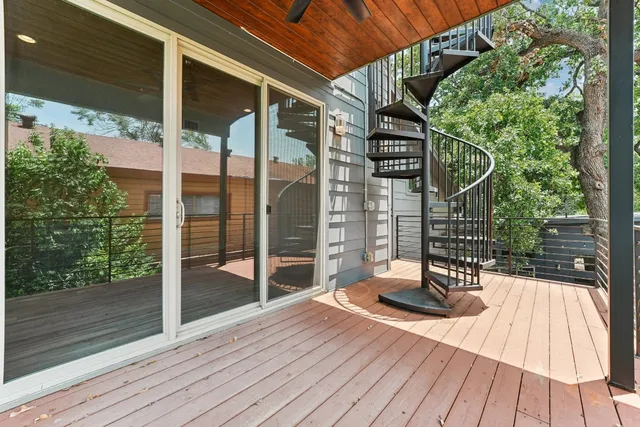 a bathroom with a shower sink and mirror