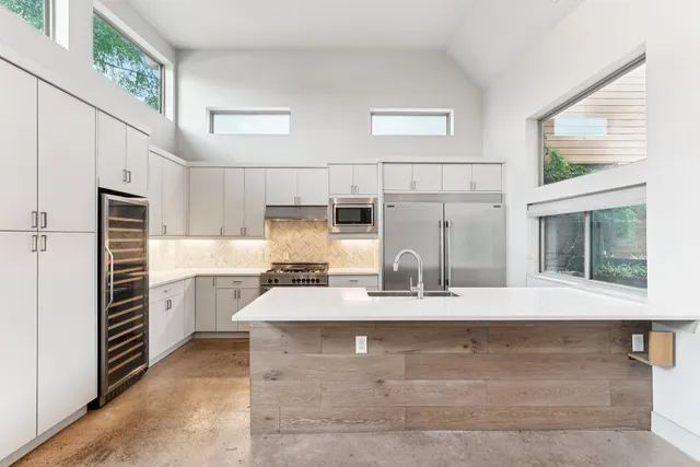 a large kitchen with cabinets
