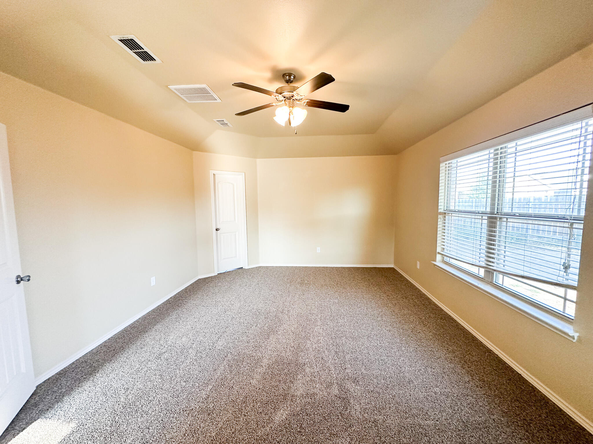 2309 101st Street Lubbock, TX 79423 - Photo 26 of 36 a view of an empty room with a window