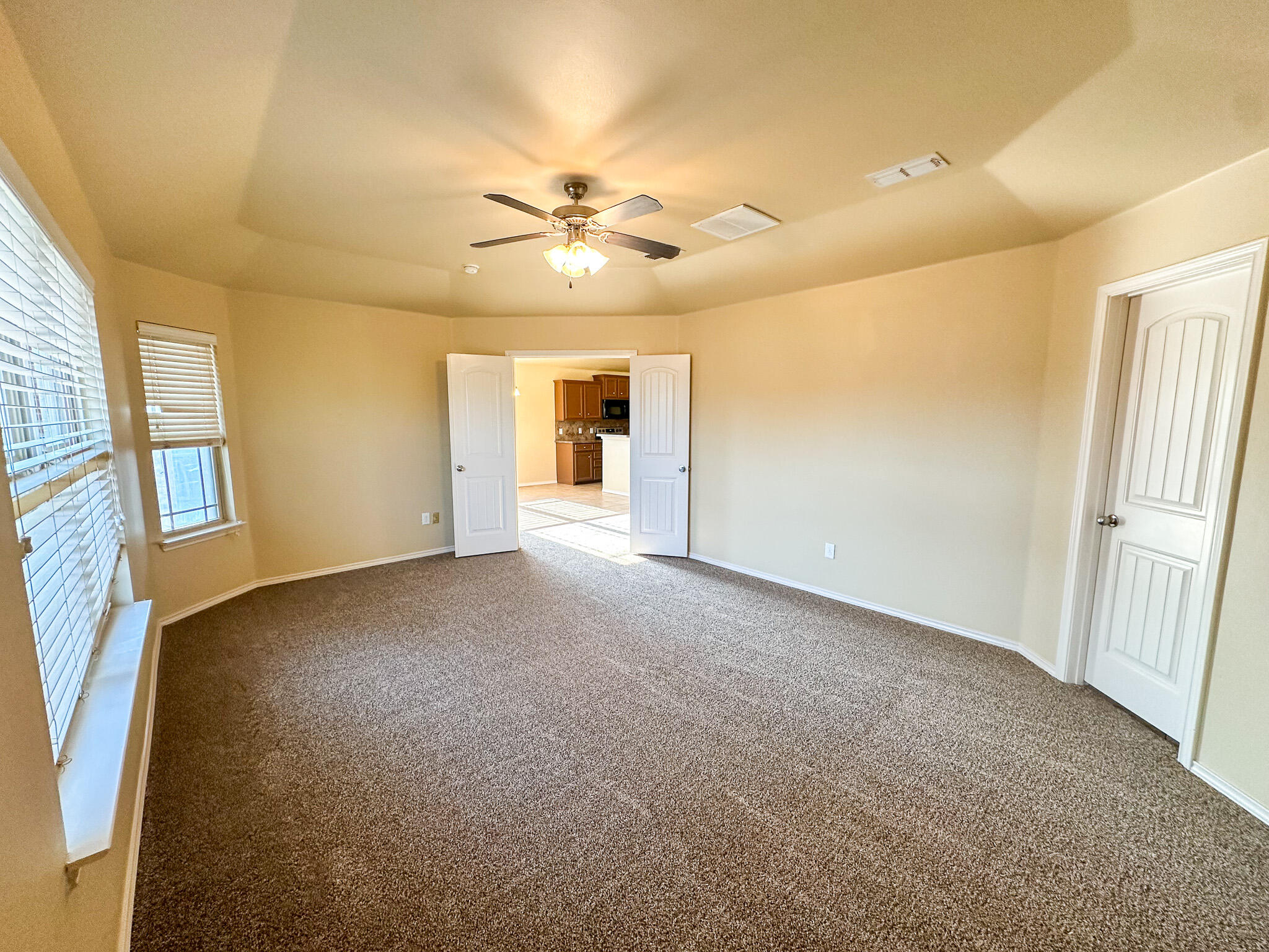 2309 101st Street Lubbock, TX 79423 - Photo 27 of 36 a view of an empty room with a window