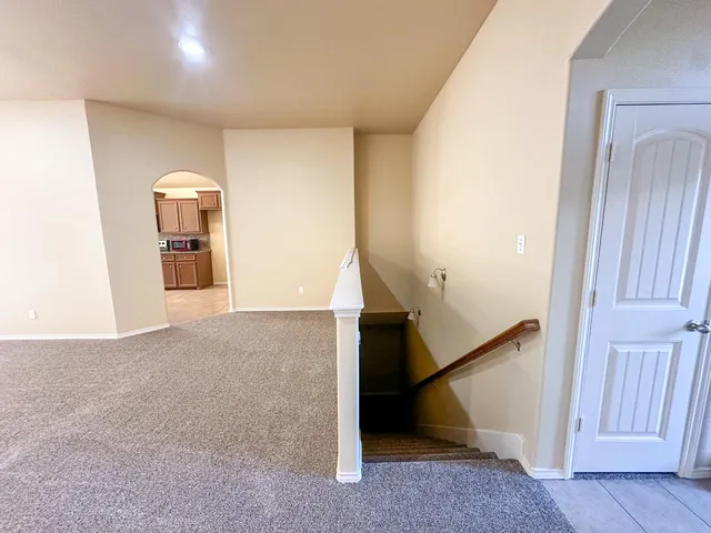 a view of a room with staircase