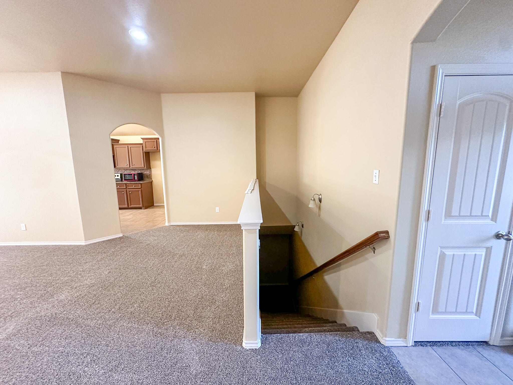 2309 101st Street Lubbock, TX 79423 - Photo 5 of 36 a view of a room with staircase