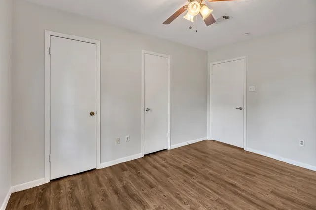 a bathroom with a sink vanity and a mirror