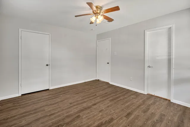 a backyard of a house with lots of green space