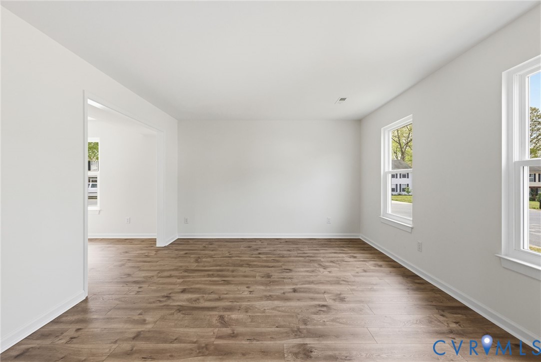 3230 Ransom Hills Road North Chesterfield, VA 23237 - Photo 14 of 27 Living room with new flooring. The living room ope