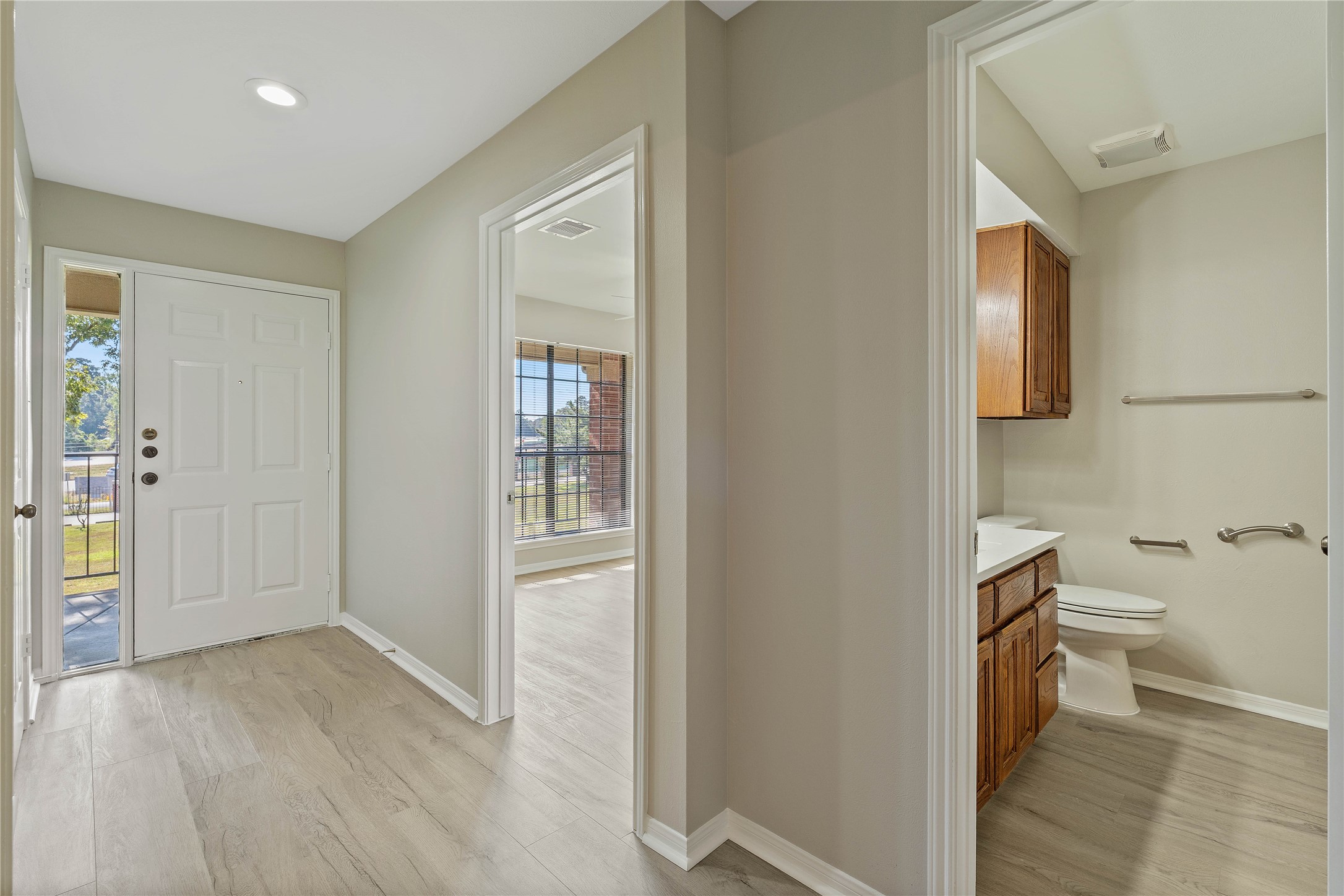 200 Panorama Drive, Unit 107 Conroe, TX 77304 - Photo 15 of 32 a bathroom with a sink and a toilet