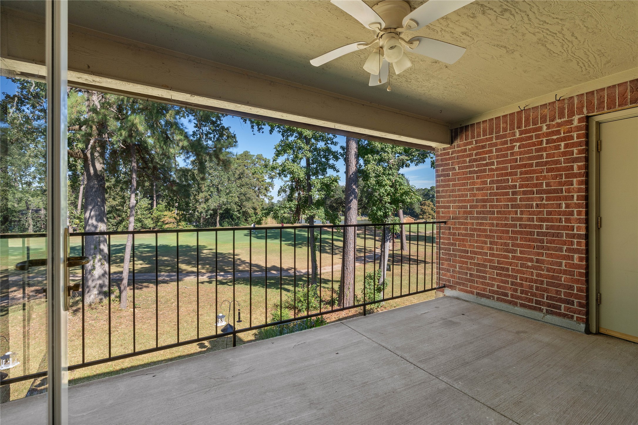 200 Panorama Drive, Unit 107 Conroe, TX 77304 - Photo 28 of 32 a view of a balcony