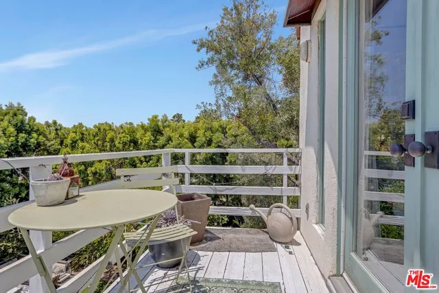 an outdoor space with patio furniture