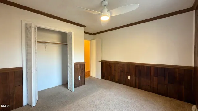 a view of bathroom with a sink and mirror