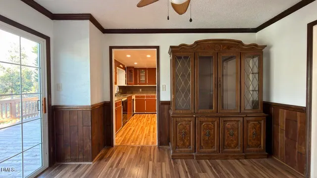 an entryway with wooden floor
