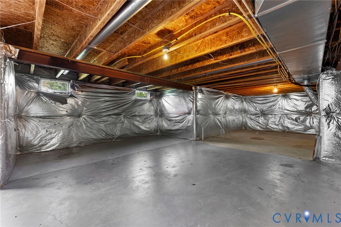 753 Blossom Tree Road Culpeper, VA 22701 - Photo 62 of 68 Unfinished basement space featuring exposed wood j