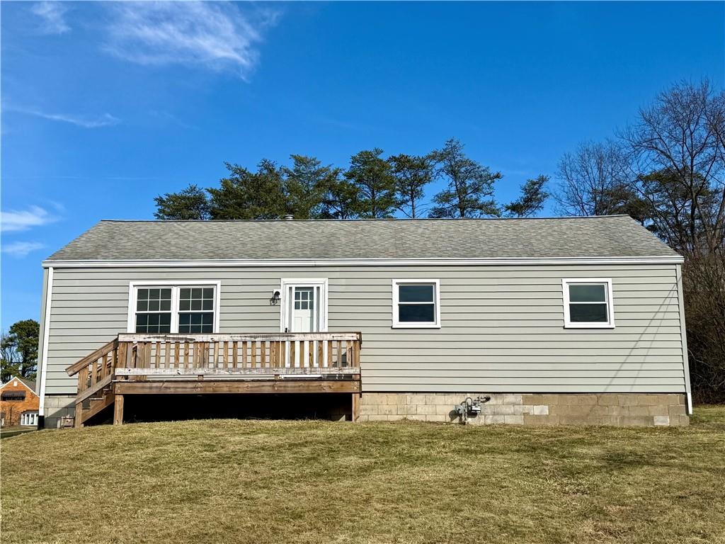 a view of a house with a roof deck