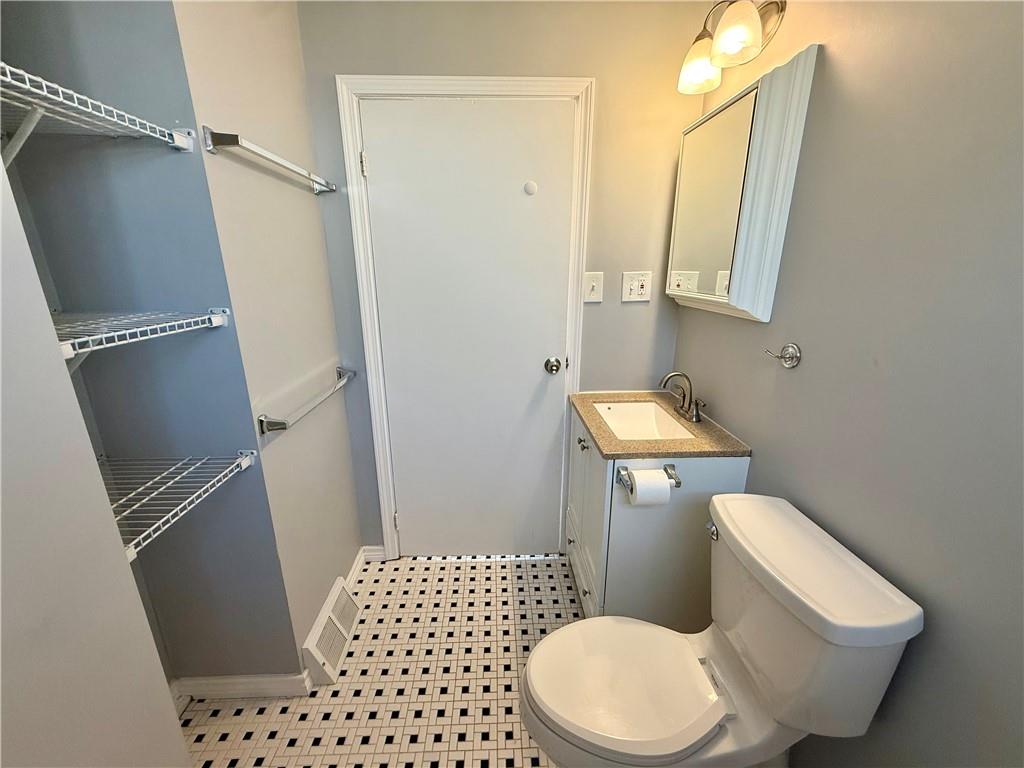 2118 Brodhead Road Aliquippa, PA 15001 - Photo 17 of 35 a white toilet sitting next to a bathroom sink