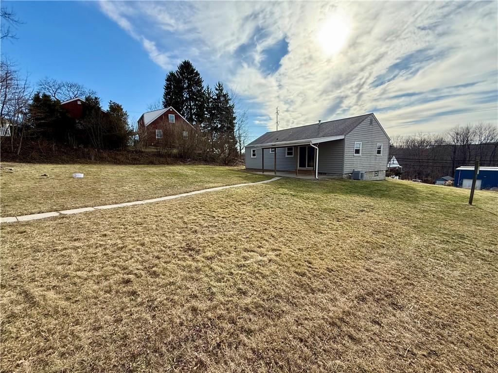 2118 Brodhead Road Aliquippa, PA 15001 - Photo 32 of 35 a view of a house with a yard