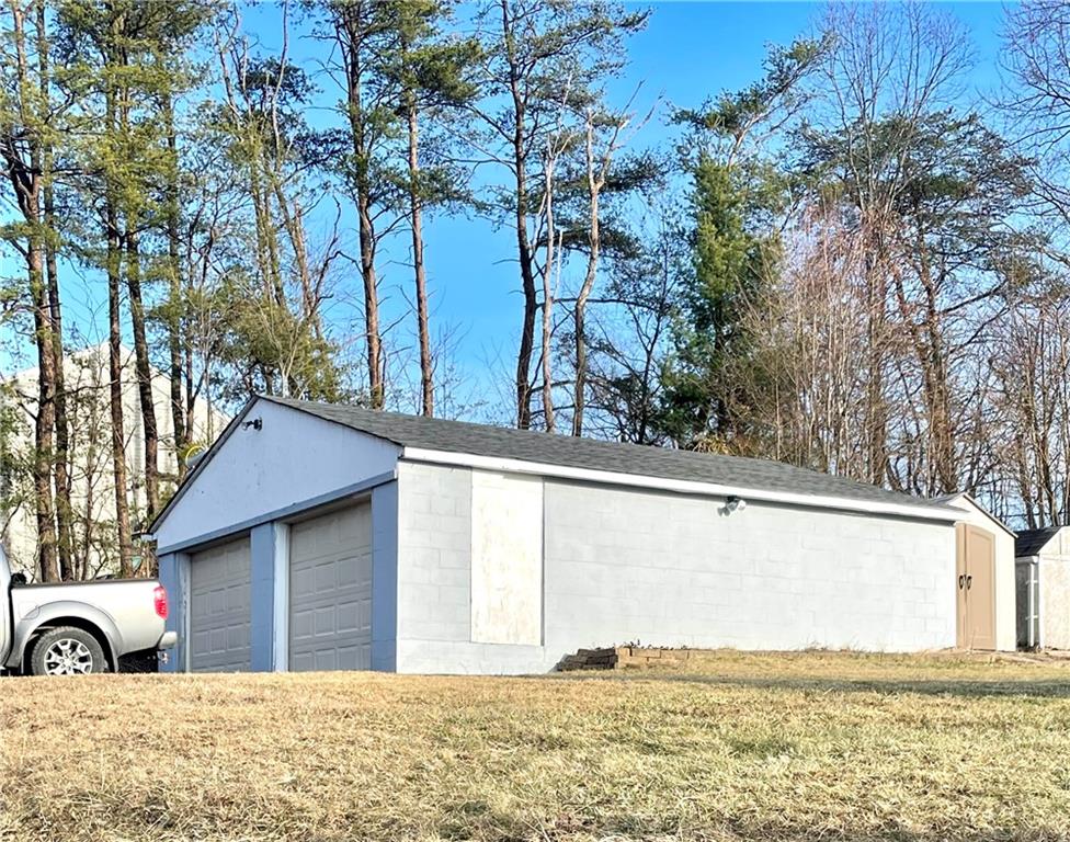2118 Brodhead Road Aliquippa, PA 15001 - Photo 34 of 35 a view of a house with a yard