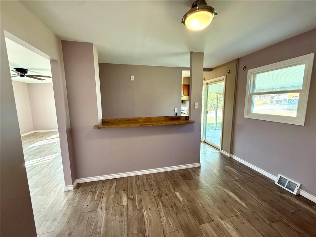 2118 Brodhead Road Aliquippa, PA 15001 - Photo 10 of 35 a view of empty room with window and wooden floor