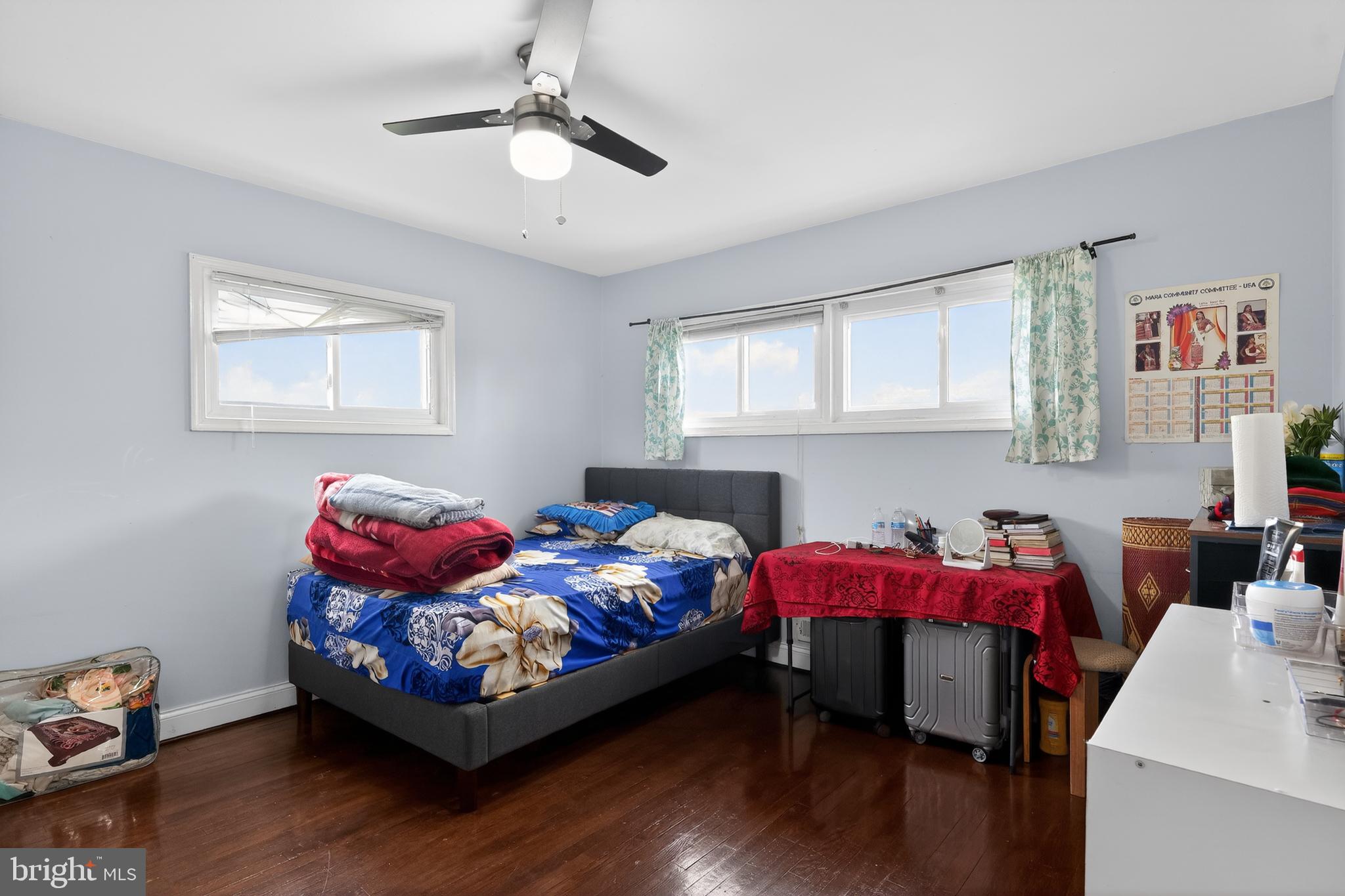 5909 Charnwood Road Catonsville, MD 21228 - Photo 22 of 31 Cozy bedroom with natural light.