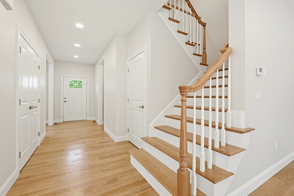 889 Maple Street Mansfield, MA 02048 - Photo 3 of 42 a view of entryway with wooden floor