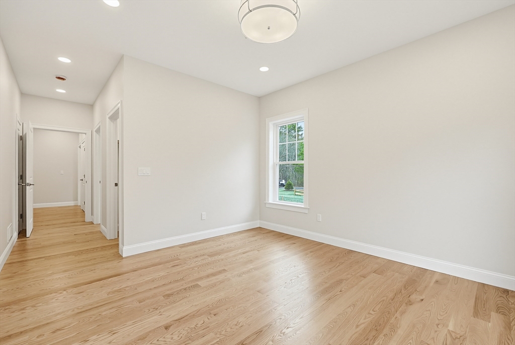 889 Maple Street Mansfield, MA 02048 - Photo 9 of 42 a view of livingroom with hardwood floor and window