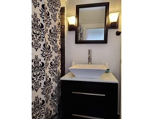 1570 Plumtree Road Springfield, MA 01119 - Photo 4 of 19 a bathroom with a sink and a mirror