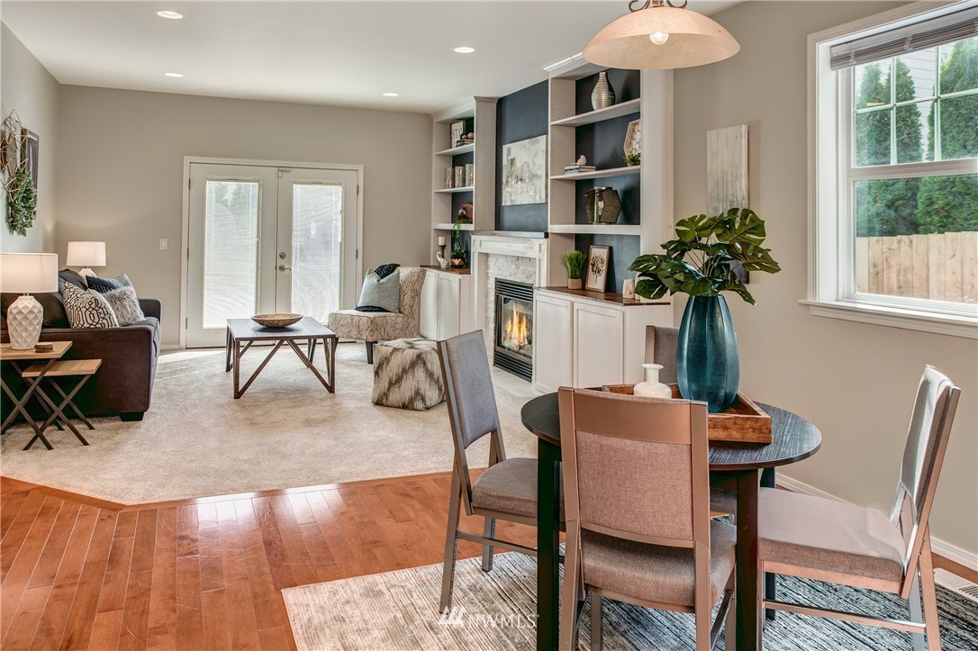 6709 Southeast 2nd Place Renton, WA 98059 - Photo 11 of 25 a living room with furniture kitchen view and a potted plant