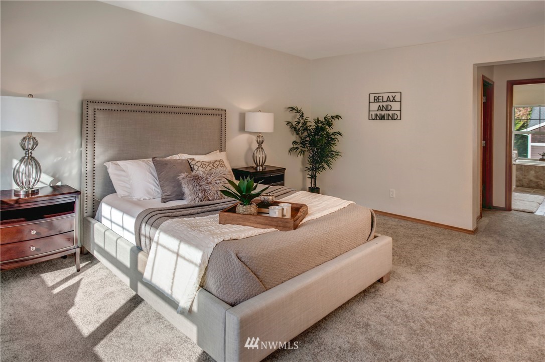 6709 Southeast 2nd Place Renton, WA 98059 - Photo 17 of 25 a bedroom with bed and window