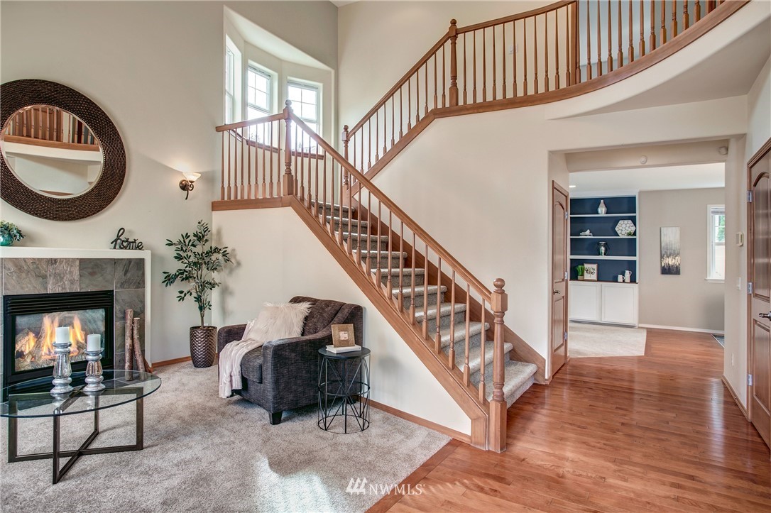 6709 Southeast 2nd Place Renton, WA 98059 - Photo 3 of 25 a view of livingroom with furniture and staircase