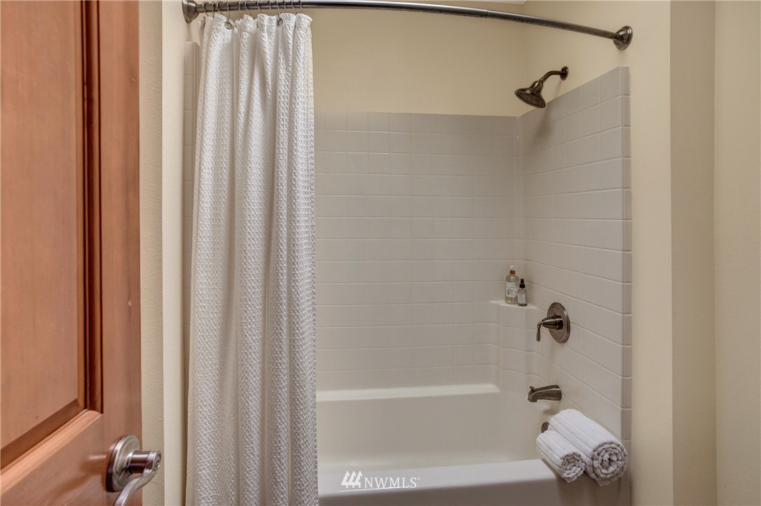 6709 Southeast 2nd Place Renton, WA 98059 - Photo 21 of 25 a bathroom with a shower